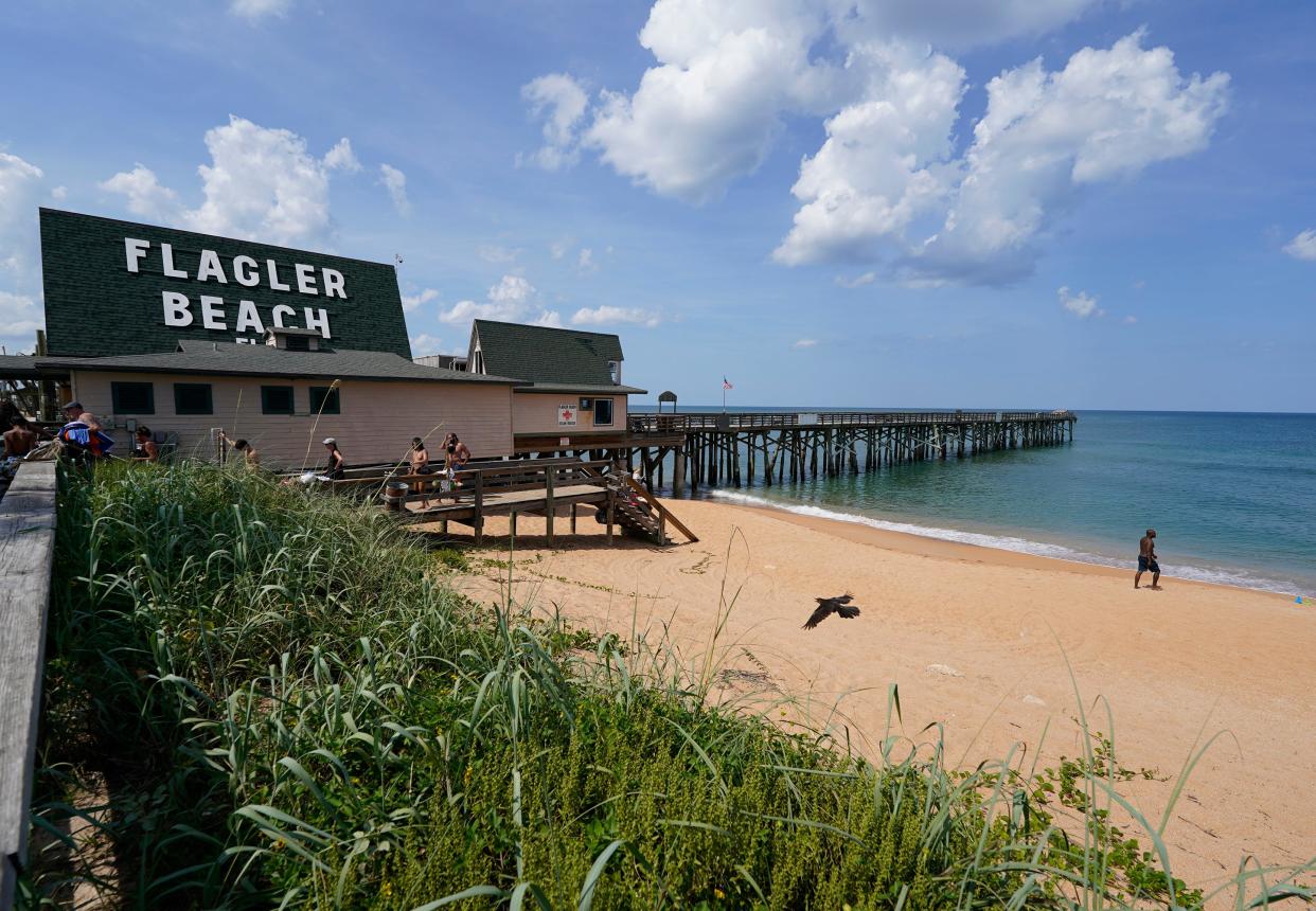 The Flagler Beach pier, pictured Tuesday, Aug. 8, 2023, will be torn down and rebuilt with concrete pilings. The proposal for the new 828-foot structure includes a firewater system, fish-cleaning stations, benches, shade structures, observation areas and turtle-friendly lighting.