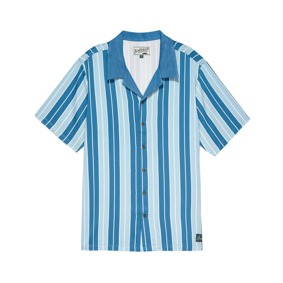 <p><a href="https://bogeyboys.com/collections/view-all/products/stripes-button-up-blue" rel="nofollow noopener" target="_blank" data-ylk="slk:Shop Now;elm:context_link;itc:0;sec:content-canvas" class="link ">Shop Now</a></p><p>Bogey Boys</p><p>bogeyboys.com</p>