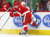 Detroit Red Wings defenseman Joe Hicketts (2) checks Toronto Maple Leafs center Nazem Kadri during the first period of an NHL hockey game Thursday, Oct. 11, 2018, in Detroit. (AP Photo/Paul Sancya)