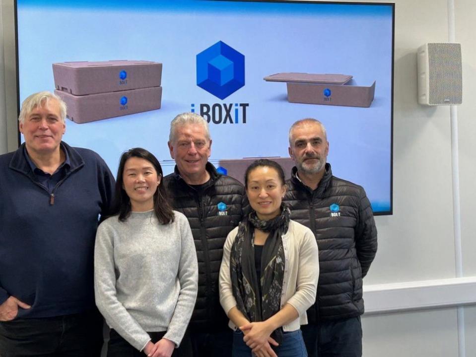 Eastern Daily Press: John Farley (centre) founder of Norwich-based iBoxit