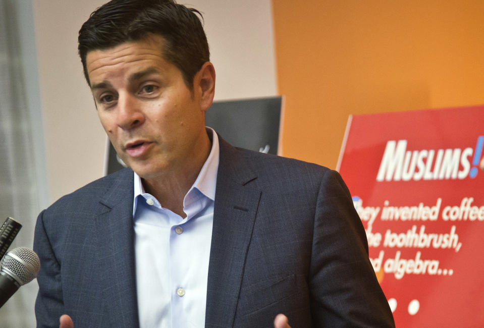 FILE - In this June 25, 2015, file photo, Muslim comedian Dean Obeidallah speaks at a news conference in New York. A federal judge awarded Muslim-American radio host Dean Obeidallah $4.1 million in monetary damages Wednesday, June 12, 2019 after he successfully sued a neo-Nazi website operator who falsely accused him of terrorism. (AP Photo/Bebeto Matthews, File)