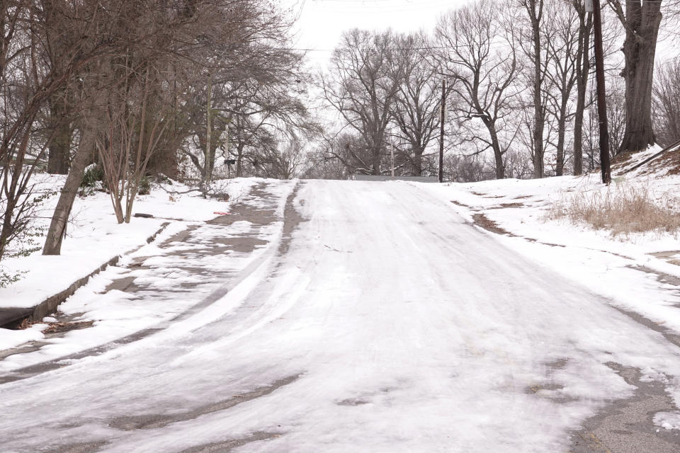 FILE - Many roads remained slick and full of ice Monday, Jan. 22, 2024, in Memphis, Tenn. Memphis' water company lifted a boil-water advisory for more than 600,000 people on Tuesday, Jan. 23, five days after the precaution was put in place due to freezing temperatures that caused pipes to break throughout the southern city. (AP Photo/Karen Pulfer Focht, File)