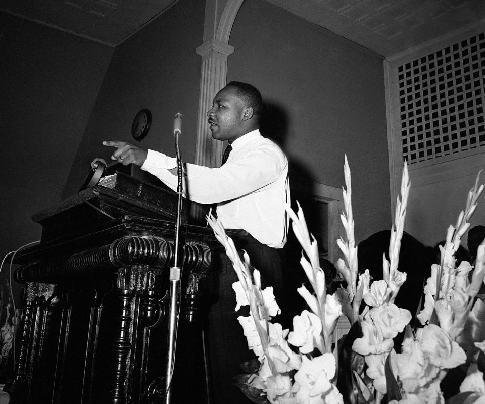 <p>Integration leader Martin Luther King Jr., Atlanta minister, speaking to a church filled to overflowing, in Albany, Georgia on July 22, 1962, about the legal fights ahead. King and other integration leaders and organizations fighting to break down segregation will start court action in a effort to upset a Federal injunction issued on banning protest demonstrations. (AP Photo) </p>