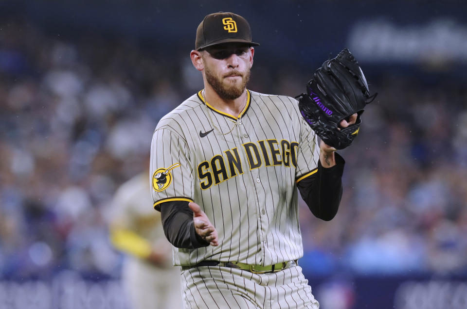 San Diego Padres starting pitcher Joe Musgrove reacts during the sixth inning of the team's baseball game against the Toronto Blue Jays on Tuesday, July 18, 2023, in Toronto. (Chris Young/The Canadian Press via AP)