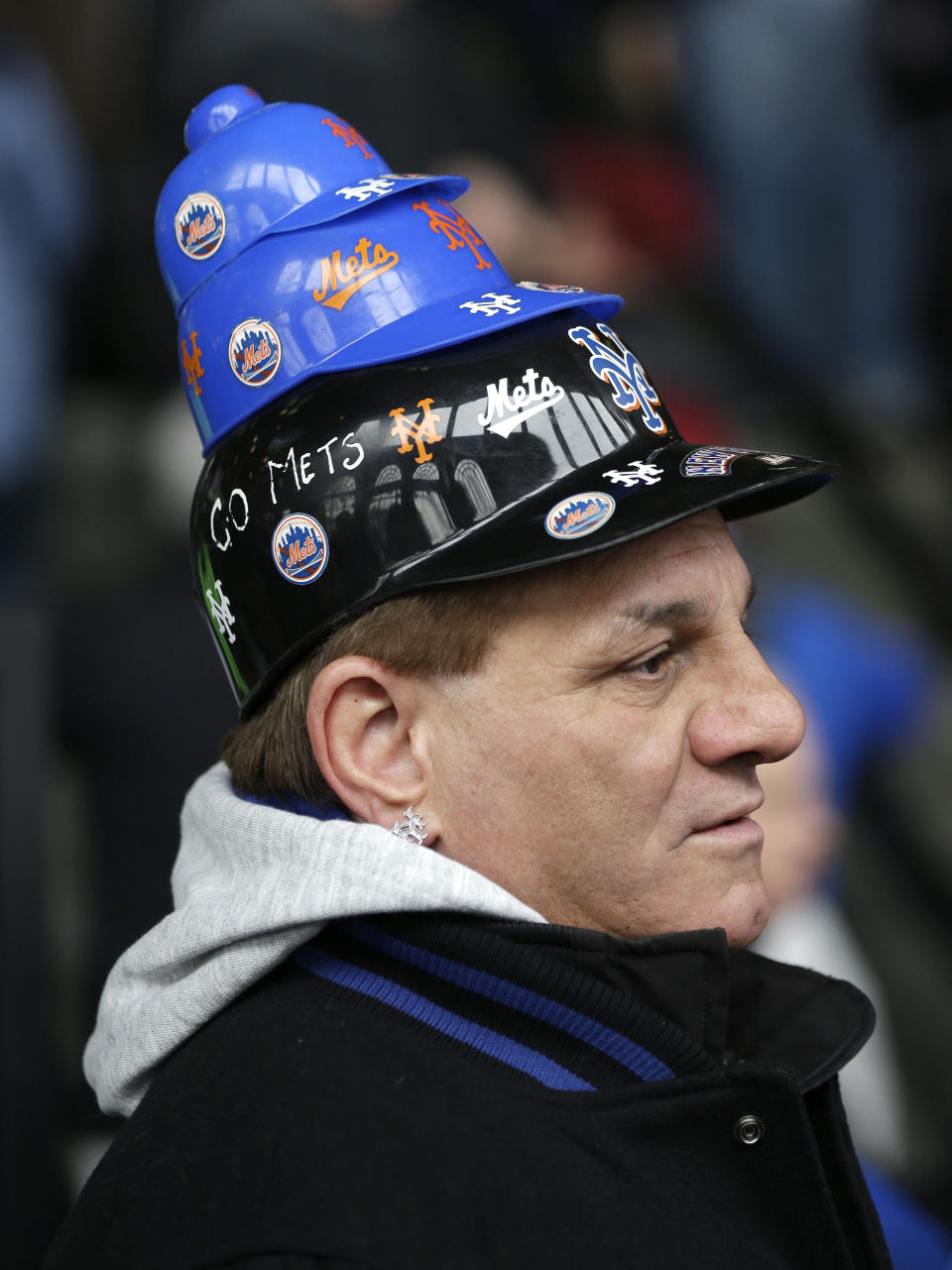 New York Mets' fan Phil Alessi arrives before a baseball game between the Mets and the Washington Nationals on opening day at Citi Field in New York, Monday, March 31, 2014. (AP Photo/Seth Wenig)