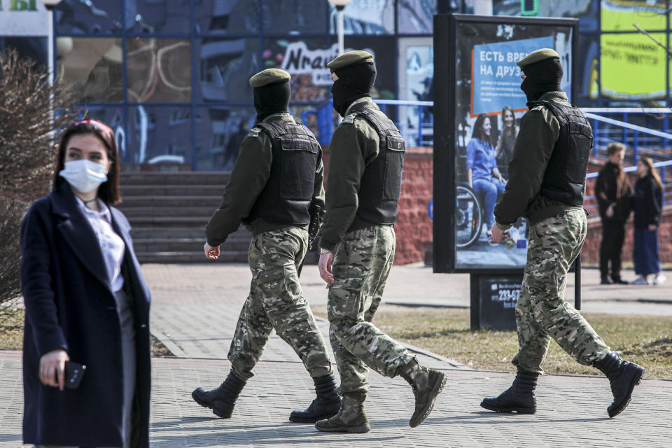 Police patrol a street to prevent an opposition action to protest the official presidential election results in Minsk, Belarus, Saturday, March 27, 2021. Belarusian opposition has urged people to protest against repressions in the country and Lukashenko's regime. (BelaPan via AP)