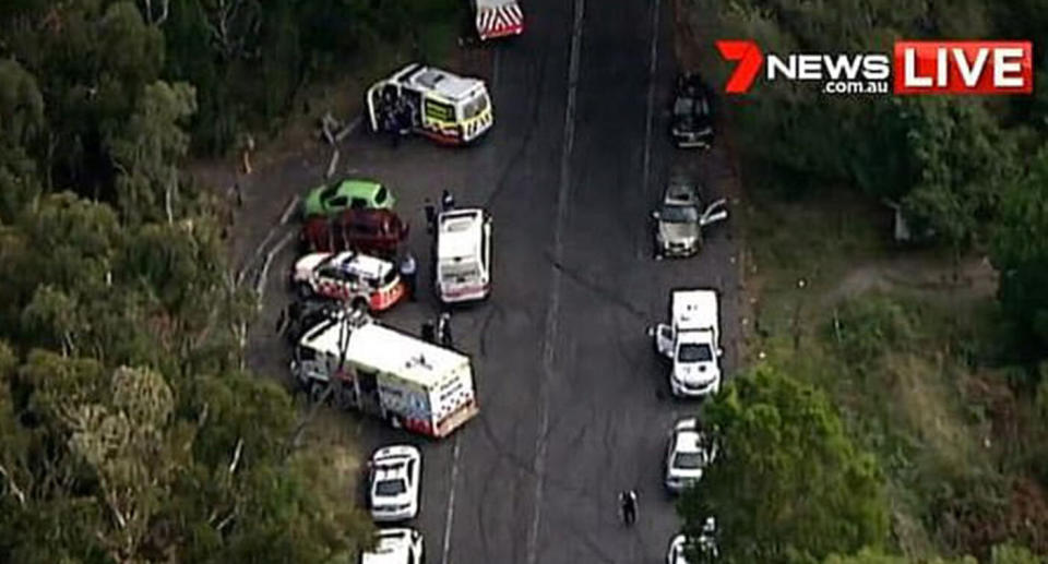 The scene at Robertson Lookout on Tuesday showing the police operation to retrieve the bodies. Source: 7 News