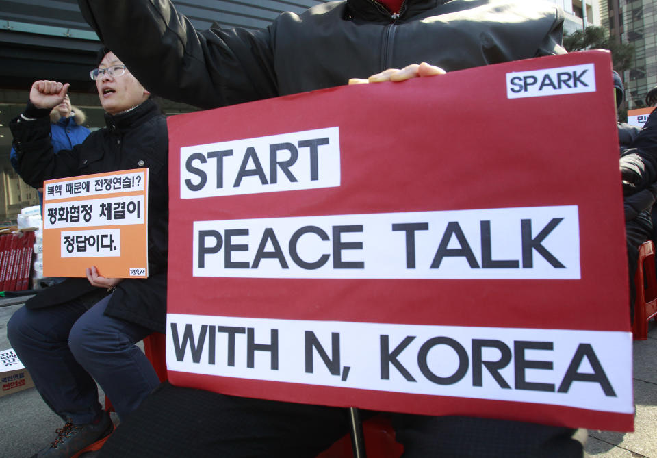 A protester shouts slogans during a rally opposing the scheduled visit of Secretary of State John Kerry near the U.S. embassy in Seoul, South Korea, Tuesday, Feb. 11, 2014. Kerry will visit South Korea on Thursday to discuss issues of mutual concerns, including efforts to denuclearize North Korea.(AP Photo/Ahn Young-joon)