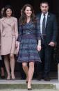 <p>To begin their Paris visit, Kate and William meet victims and first response teams present during France's terrorist attacks. She wears a positive and colorful Chanel dress for the occasion, paired with a Chanel belt and handbag.</p>