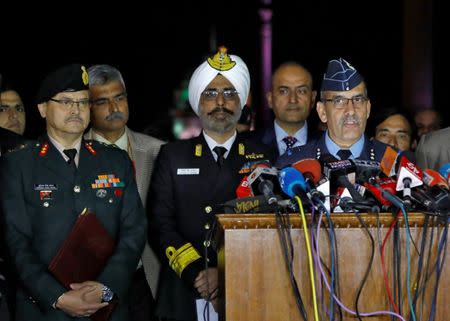 India's Air Vice-Marshal R.G.K Kapoor (R) flanked by Navy's Rear Admiral DS Gujral (C) and Army's Major General Surinder Singh Mahal speaks with the media in the lawns of India's Defence Ministry in New Delhi, India, February 28, 2019. REUTERS/Anushree Fadnavis