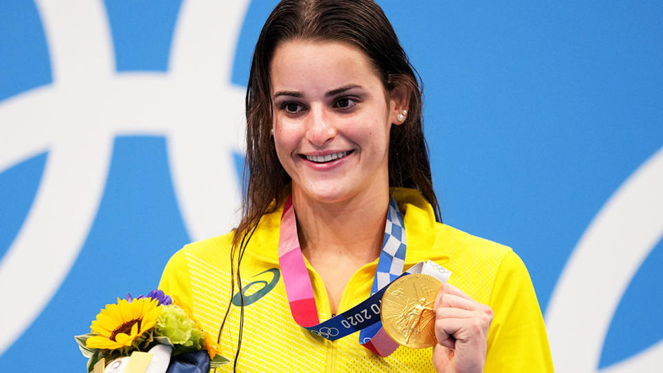 Kaylee McKeown is pictured here on the podium in Tokyo with her gold medal.