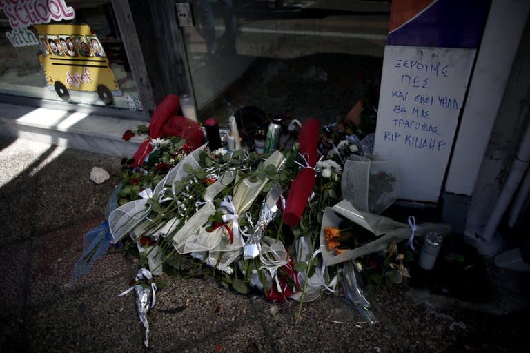 Flowers are seen on September 19, 2103 at the spot where Pavlos Fyssas was murdered in Piraeus, Greece. Greece's prime minister on Thursday vowed to rein in the neo-Nazi Golden Dawn party after the murder of an anti-fascist singer by one of its supporters sparked nationwide outrage