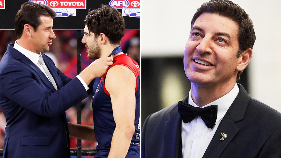 Andrew Embley, who presented Christian Petracca with the Norm Smith medal after the AFL grand final, took a cheeky shot at Basil Zempilas' hosting performance. Pictures: Getty Images