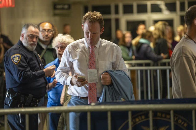 Andrew Giuliani wearing a belt that says FJB on the side outside of the courtroom hearing former President Donald Trump's hush-money trial. Pool Photo by Steven Hirsch/UPI