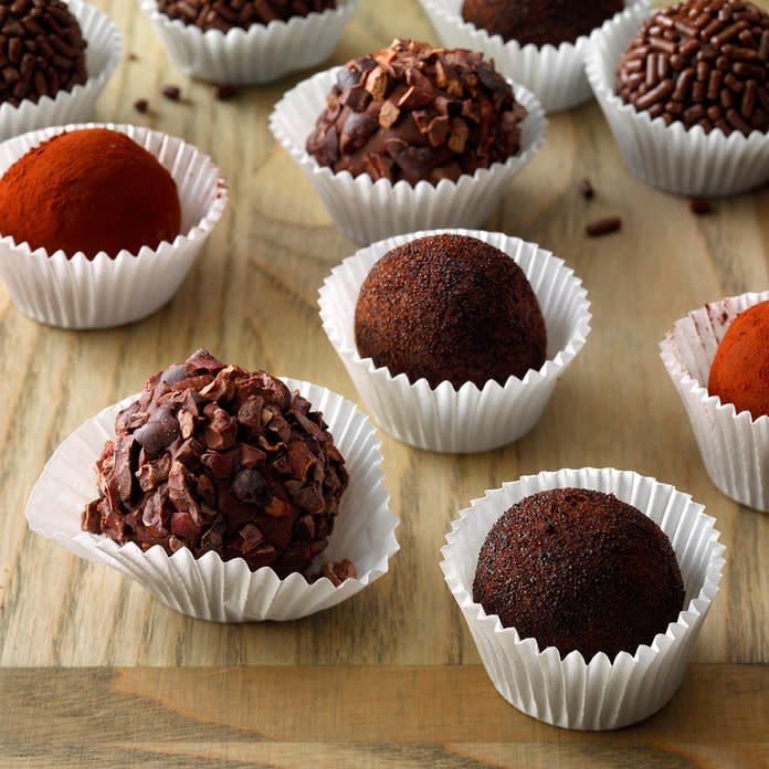 Homemade chocolate tuffles with various decorations and toppings.