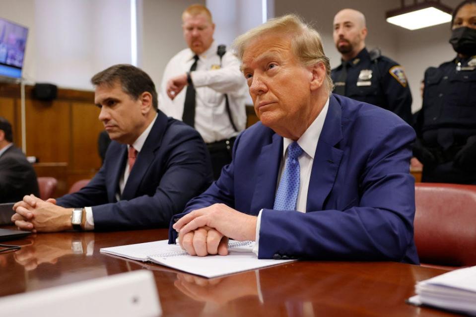 NEW YORK, NEW YORK - MAY 20: Former U.S. President Donald Trump sits in the courtroom during his hush money trial at Manhattan Criminal Court on May 20, 2024 in New York City. Michael Cohen, Trump's former attorney, will take the stand again to continue his cross examination by the defense in the former president's hush money trial. Cohen is the prosecution's final witness in the trial and are expected to rest their case this week. Cohen's $130,000 payment to Stormy Daniels is tied to Trump's 34 felony counts of falsifying business records in the first of his criminal cases to go to trial. (Photo by Michael M. Santiago/Getty Images)