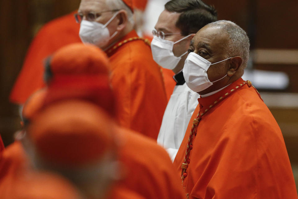 American newly appointed Cardinal Wilton D. Gregory attends a consistory ceremony where 13 bishops were elevated to a cardinal's rank in St. Peter’s Basilica at the Vatican, Saturday, Nov. 28, 2020. (Fabio Frustaci/POOL via AP)