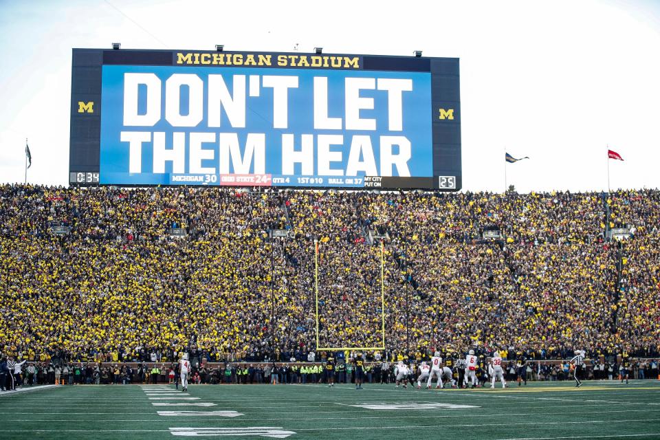 Michigan fans cheer during the second half of the game against Ohio State before a play at Michigan Stadium in Ann Arbor on Saturday, Nov. 25, 2023.