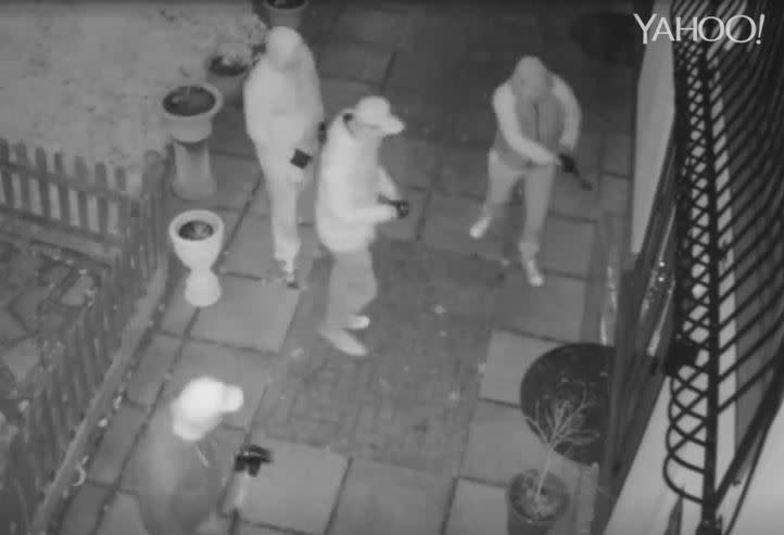 CCTV footage captured the gang preparing to force entry to the family's home