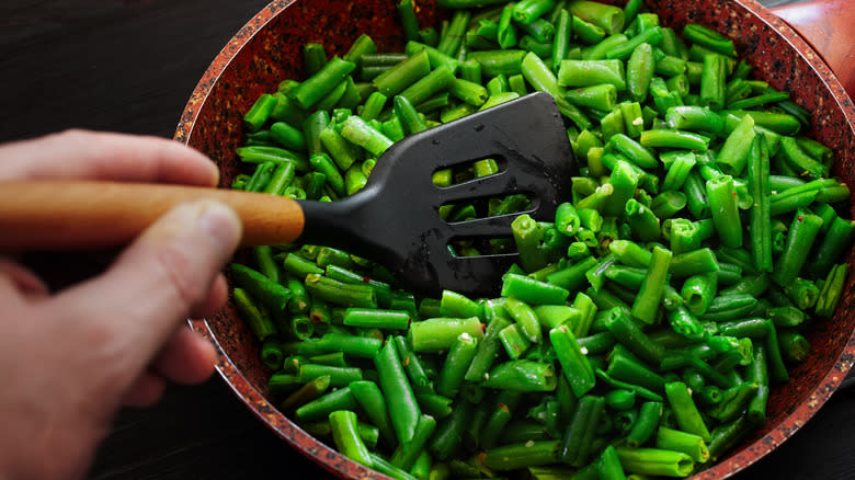 Stirring fresh green beans