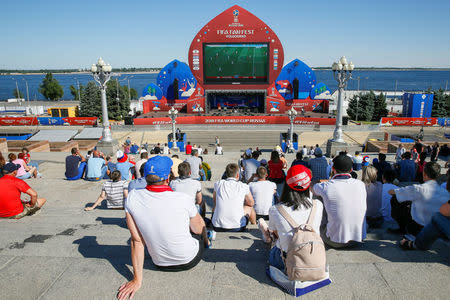 Soccer Football - FIFA World Cup - Group G - Tunisia v England - Volgograd, Russia - June 17, 2018 - Fans watch the public broadcast at a Fan Fest zone. REUTERS/Gleb Garanich