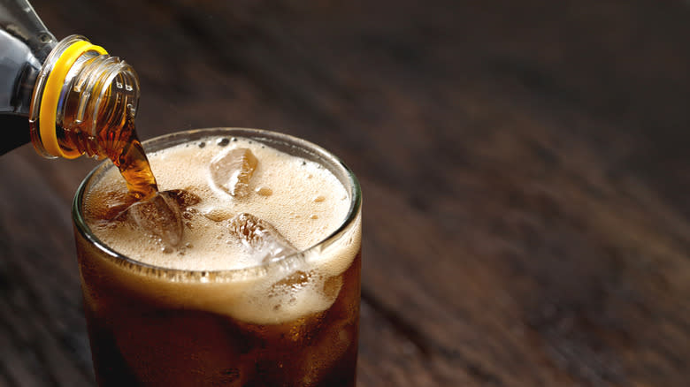 Cola poured into glass