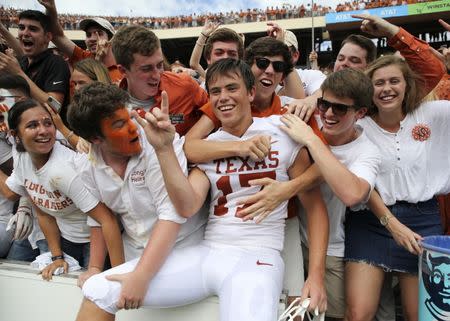 Oct 6, 2018; Dallas, TX, USA; Texas Longhorns place kicker Cameron Dicker (17) celebrates with fans after the game against the Oklahoma Sooners at the Cotton Bowl. Kevin Jairaj-USA TODAY Sports