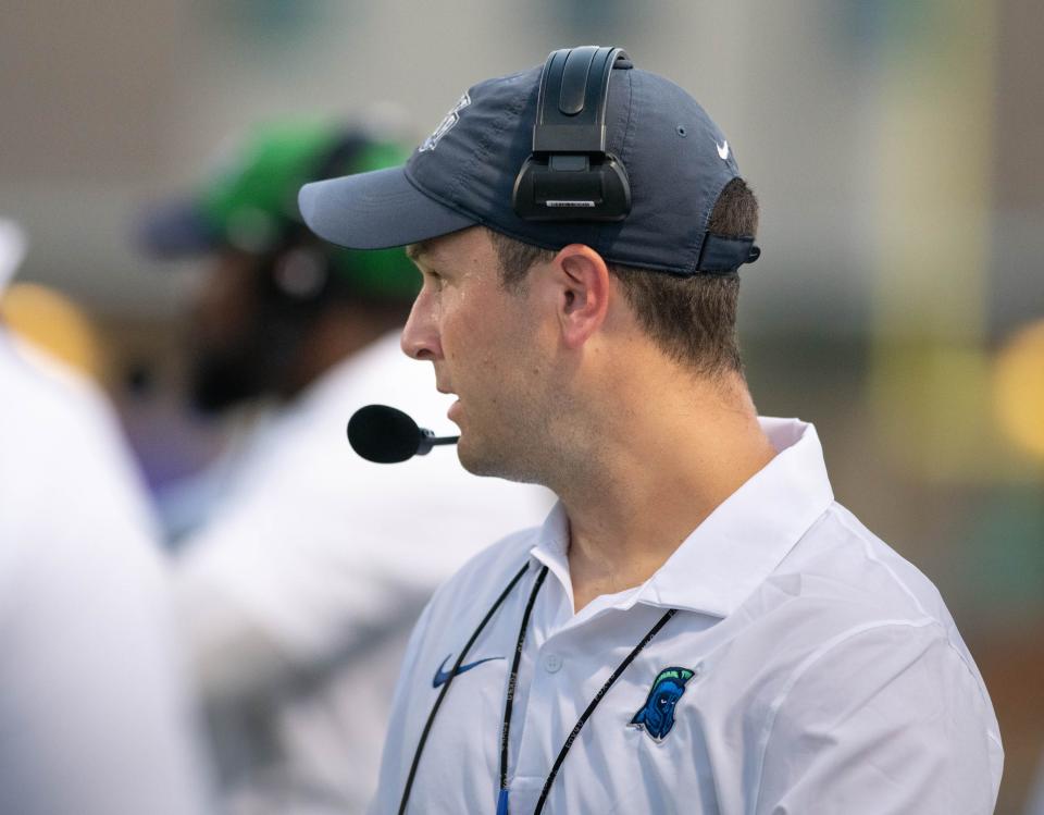 Argos head coach Kaleb Nobles keeps an eye on the action during a football scrimmage at the University of West Florida in Pensacola on Wednesday, Aug. 23, 2023.