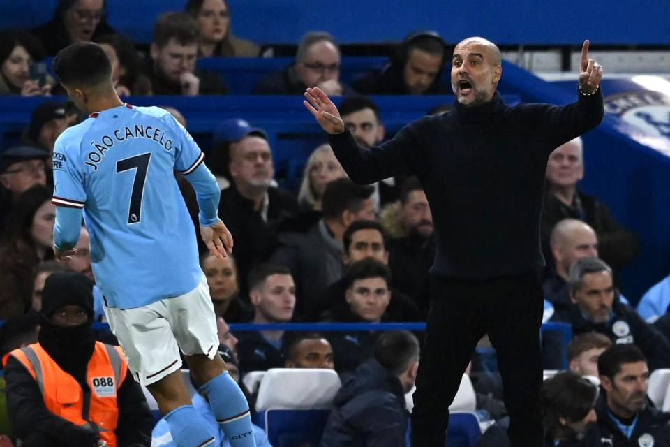 Bust up: Cancelo and Guardiola are believed to have fallen out, paving the way for his move to Bayern (AFP via Getty Images)