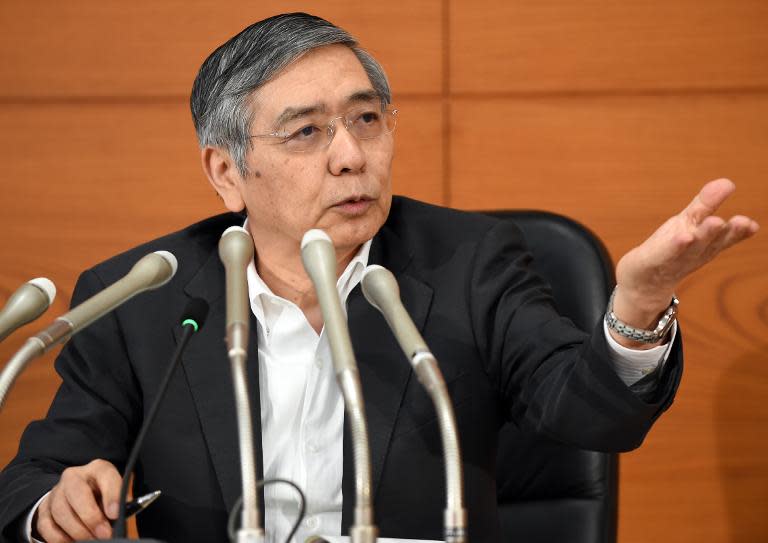 Governor of the Bank of Japan (BoJ), Haruhiko Kuroda, speaks during a press conference following the bank's policy meeting, in Tokyo, on May 22, 2015