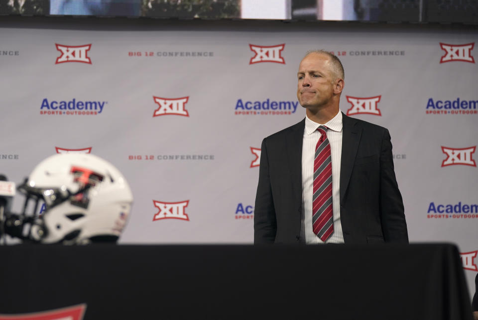 FILE - Texas Tech head coach Matt Wells looks out from the stage before speaking at the NCAA college football Big 12 media days in Arlington, Texas, in this Thursday, July 15, 2021, file photo. Texas Tech fired coach Matt Wells on Monday, Oct. 25, 2021, two days after the Red Raiders couldn't hold a two-touchdown halftime lead in a loss at home to Kansas State. (AP Photo/LM Otero, File)