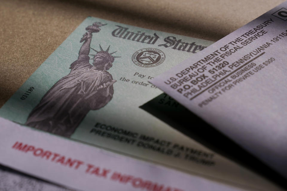 A stimulus check issued by the IRS to help combat the adverse economic effects of the COVID-19 outbreak is seen in San Antonio, Thursday, Jan. 28, 2021. (AP Photo/Eric Gay)