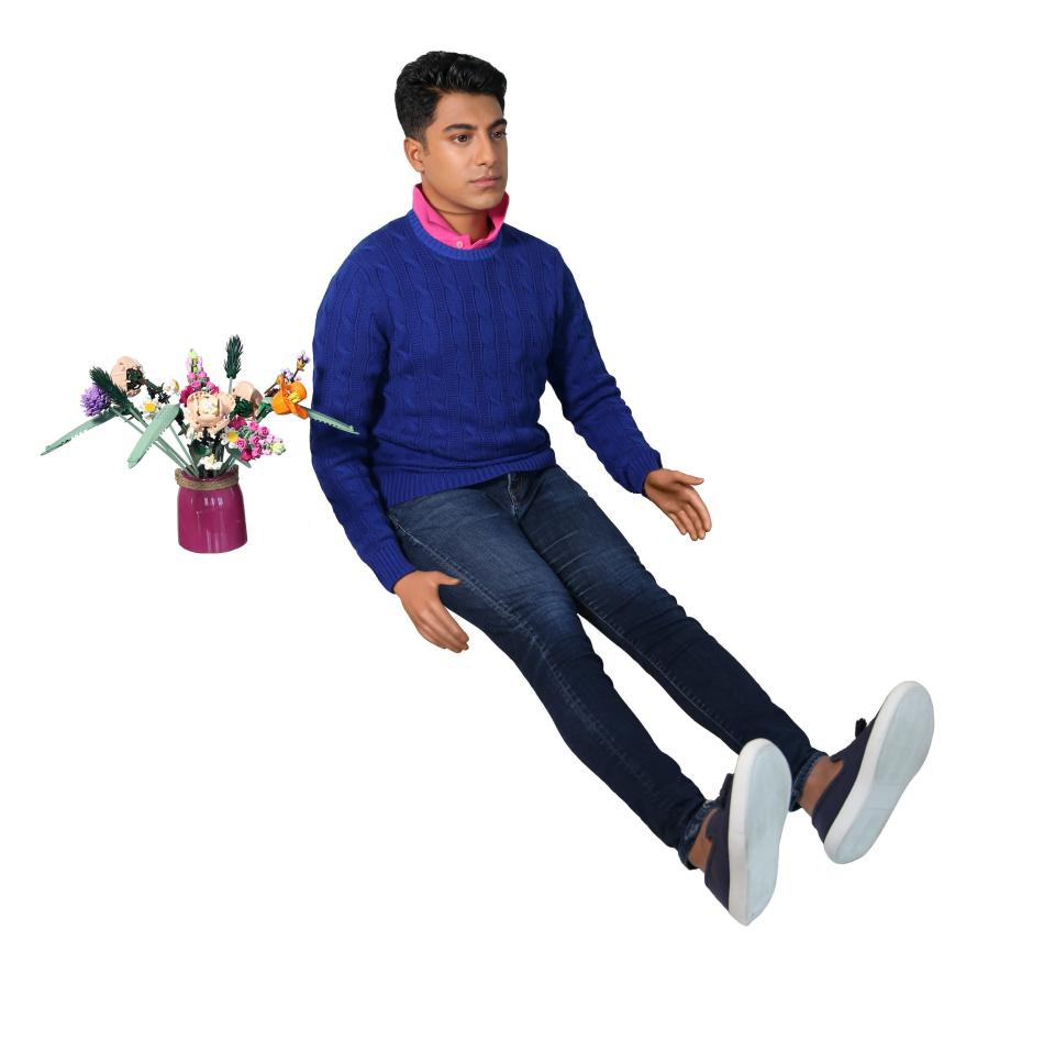 illustration of Ritesh next to flowers