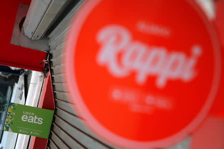 The logo of Uber Eats and the Colombian on-demand delivery company Rappi are seen in Mexico City, Mexico May 20, 2019. REUTERS/Carlos Jasso