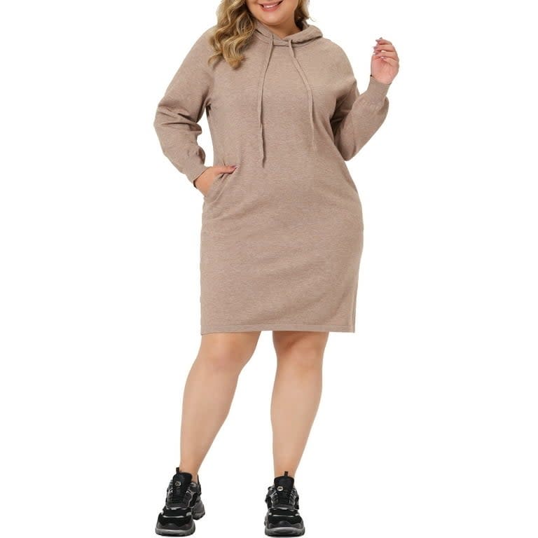 a model wearing the dress in beige