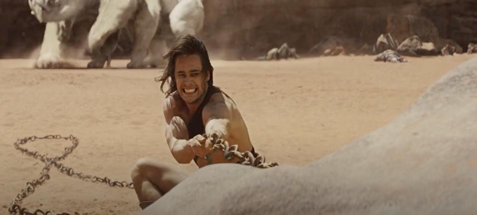 John Carter pulls on a chain