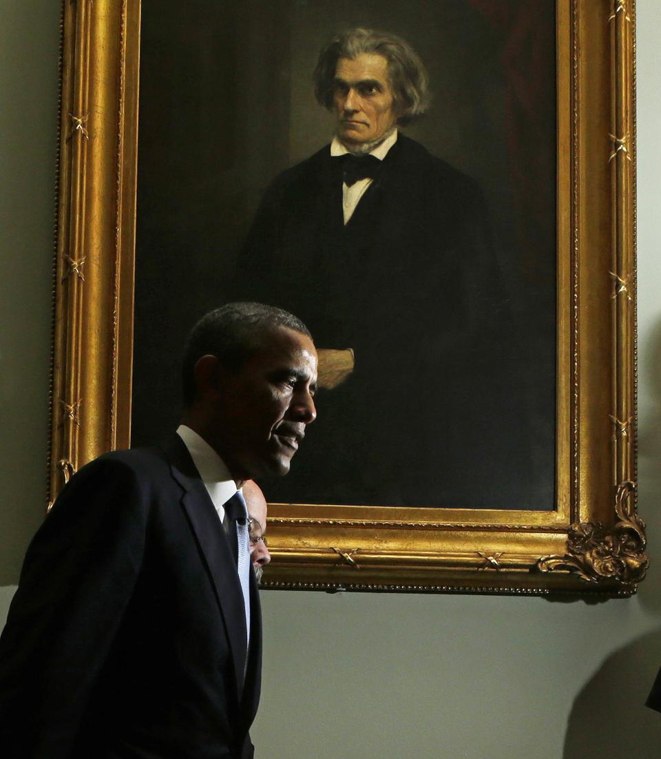 U.S. President Barack Obama arrives at a luncheon meeting with Senate Democrats in Washington September 10, 2013. House of Representatives Speaker John Boehner, a Republican who announced last week he would support a strike, said the American people still did not support military action in Syria and Obama needed to make a stronger case. REUTERS/Gary Cameron (UNITED STATES - Tags: POLITICS CIVIL UNREST)