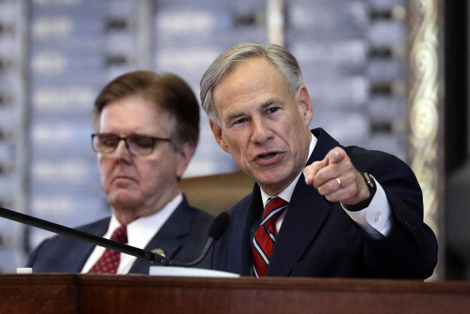 Texas Gov. Greg Abbott, right, sits beside fellow immigration hardliner Lt. Gov. Dan Patrick. Both will join a state task force that aims to ramp up efforts to surveil white nationalists. (Photo: ASSOCIATED PRESS)