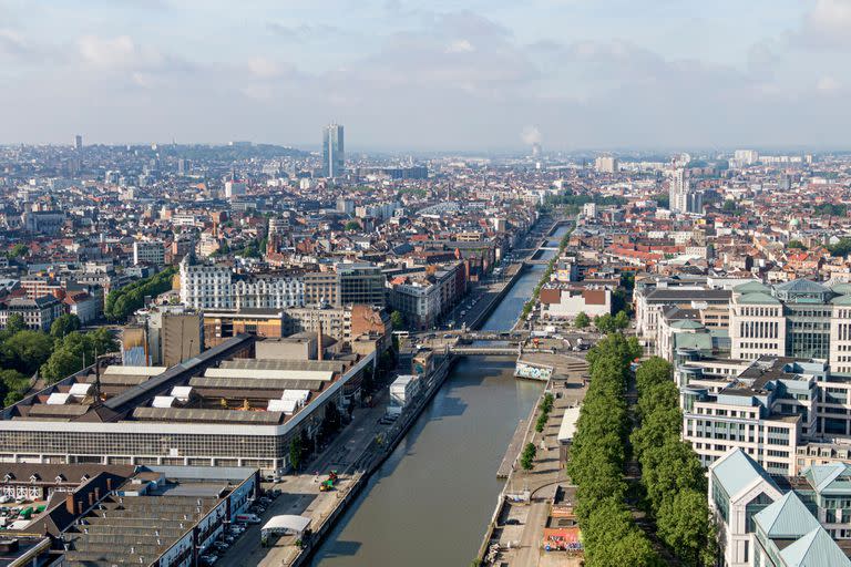 Brussels, Belgium - May 12, 2022: Urban landscape of the city of Brussels. The Senne river canal crossing Brussels.