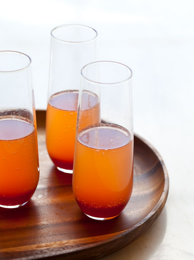 <p>Mix up a big batch of this beverage (staring in-season fruit!) for a self-serve cocktail guests can refill on their own. </p><p><strong>Get the recipe at <a rel="nofollow noopener" href="http://www.spoonforkbacon.com/2011/10/spice-blood-orange-champagne-punch/" target="_blank" data-ylk="slk:Spoon Fork Bacon;elm:context_link;itc:0;sec:content-canvas" class="link ">Spoon Fork Bacon</a>.</strong></p>