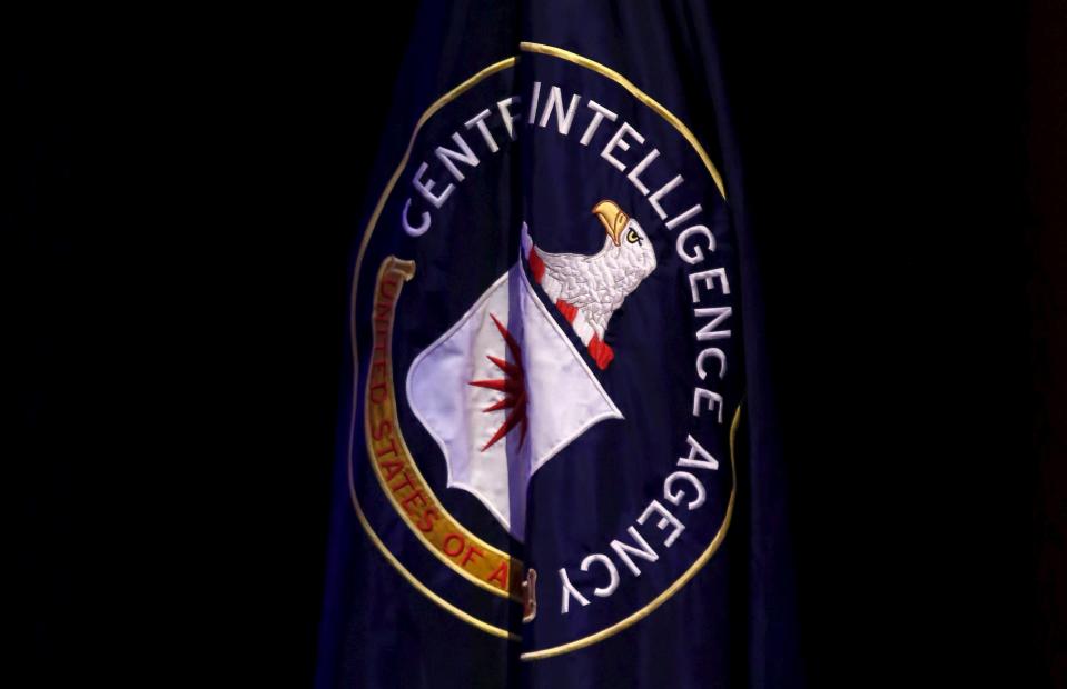 The Central Intelligence Agency (CIA) flag is displayed on stage during a conference on national security entitled "The Ethos and Profession of Intelligence" in Washington October 27, 2015. REUTERS/Yuri Gripas