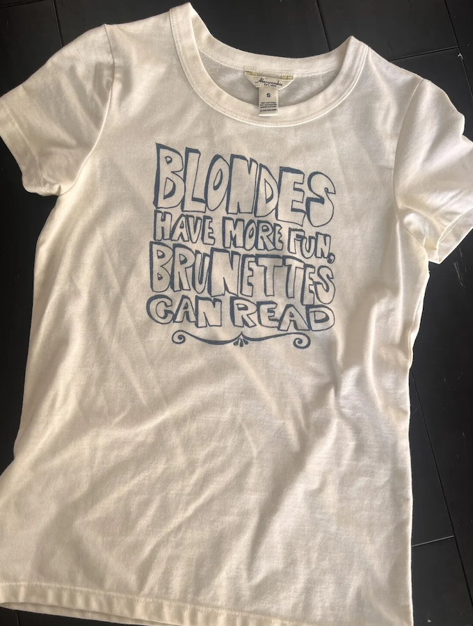 T-shirt with text "BLONDES HAVE MORE FUN, BRUNETTES CAN READ"