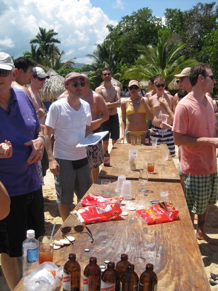 Looking casual in a yellow bikini and trucker hat, Meghan was all about the beer pong as she celebrated her 2011 wedding to Trevor Engelson in 2011. Photo: Mega