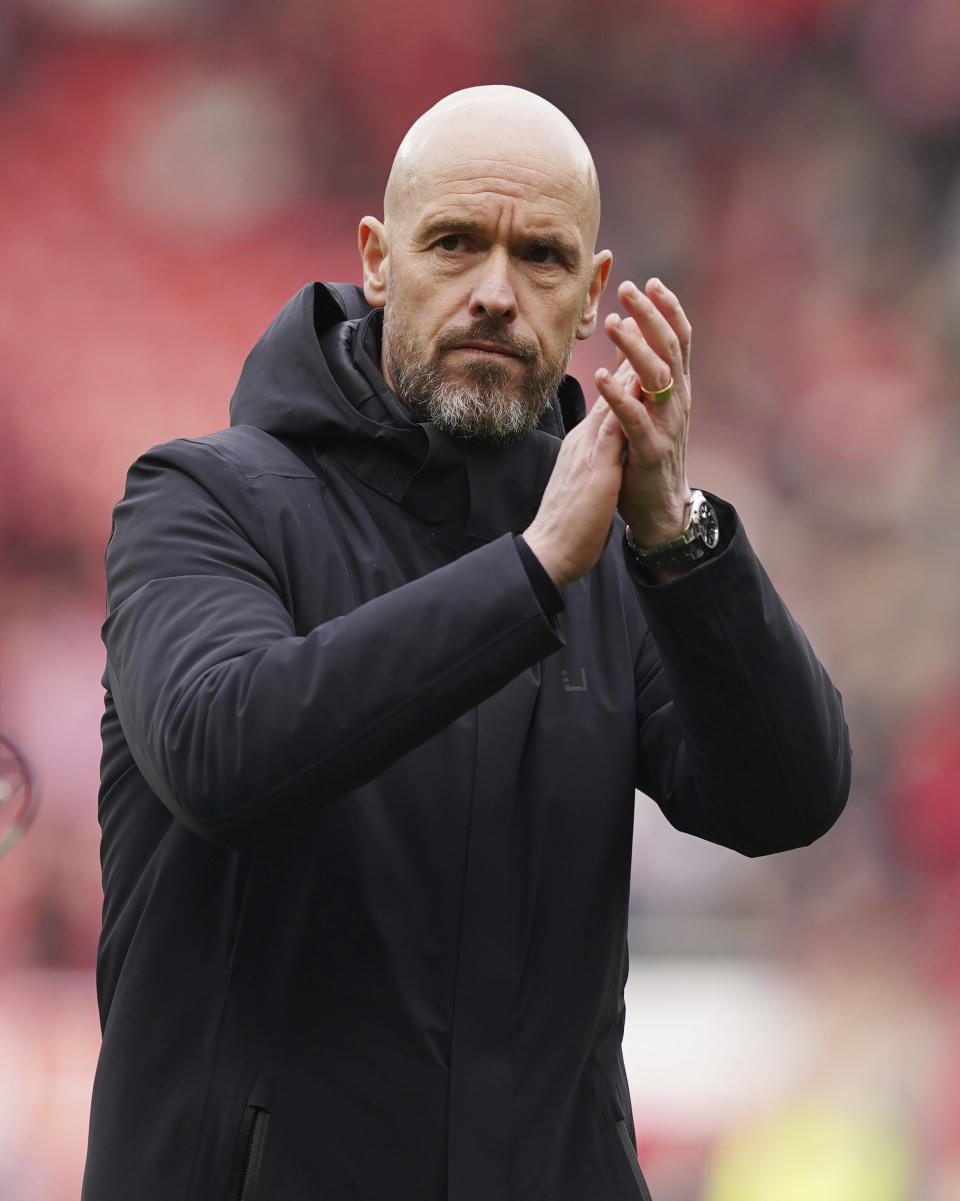 Manchester United's head coach Erik ten Hag applauds after the English Premier League soccer match between Manchester United and Burnley at Old Trafford, Manchester, England, Saturday, April 27, 2024. (Martin Rickett/PA via AP)