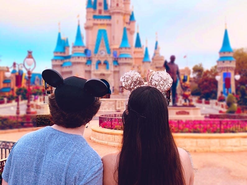 saira and friend looking at the castle at disney world