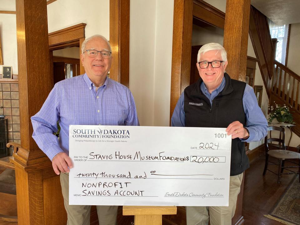 The Stavig House Museum in Sisseton has been awarded a $20,000 from the South Dakota Community Foundation (SDCF). Stavig House President John Rasmussen and Community Development Coordinator Patrick Gallagher of the SDCF are pictured with a check announcing the grant.