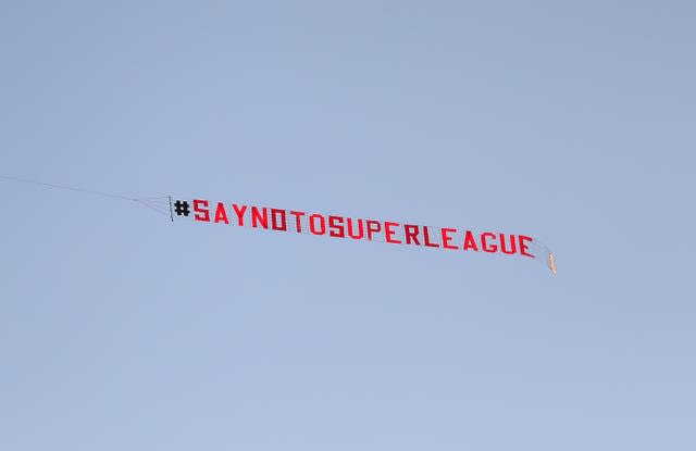 A plane with a ‘Say No To Super League’ banner flies over Elland Road on Monday