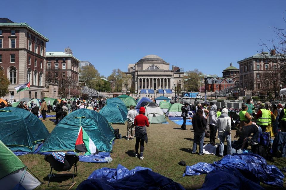 Students protest in support of Palestinians on Columbia University campus, as protests continue inside and outside the university, amid the ongoing conflict between Israel and the Palestinian Islamist group Hamas, in New York City on 22 April 2024 (REUTERS)