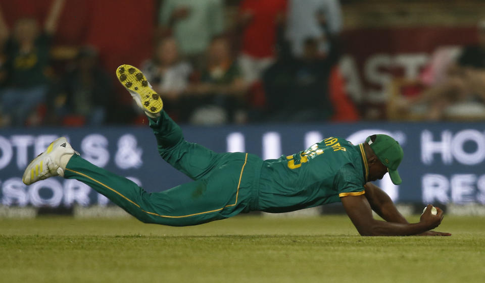 South Africa's Kagiso Rabada catches the ball to dismiss Australia's Nathan Ellis during the fourth ODI cricket match between South Africa and Australia in Pretoria, South Africa, Friday, Sept. 15, 2023. (AP Photo)