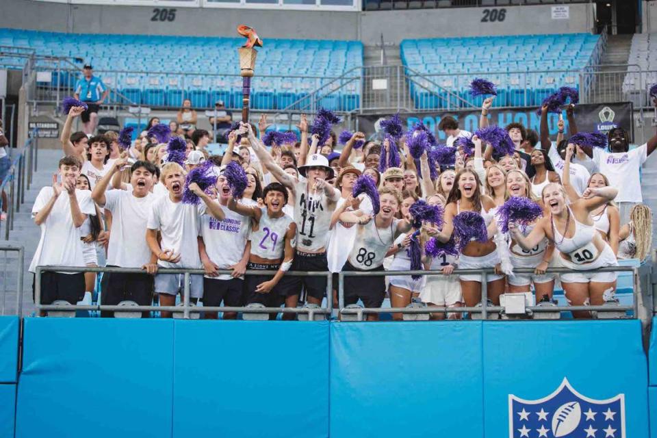 Rock Hill Northwestern’s fans cheer before the game against Providence Day Saturday night in the Keep Pounding High School Classic on August 19, 2023 at Bank of America Stadium.